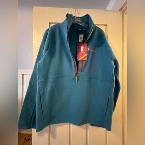 Cotopaxi Light Blue “lake” Fleece Jacket with Orange Accents